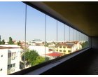 Cum va ajuta un serviciu de inchidere balcon cu sticla